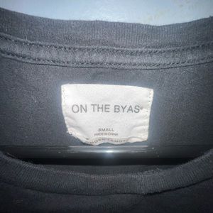 On the Byas Small Longer Length Black Tee